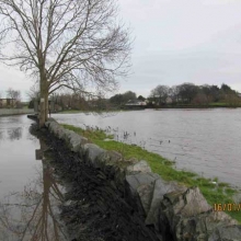 View below Clohamon bridge showing major flooding over bridge access road 